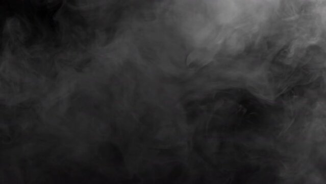 Thick smoke on a black background. Gray fog. Smoke