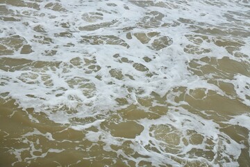 The sea or the ocean during a storm. Dirty sea waters. High waves