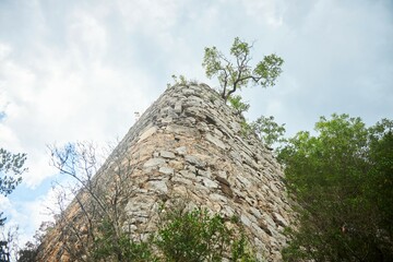 The remains of the walls of an ancient defensive structure.
