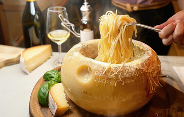 Cheese Wheel Spaghetti Pasta Cooked inside a giant Parmesan