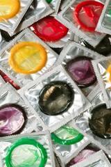 Colorful condoms background.