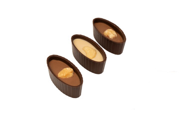 Chocolate candy with a nut isolated on a white background.