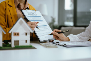 Home Insurance and Real estate investment concept,  new client after signing agreement contract with approved property application form.
