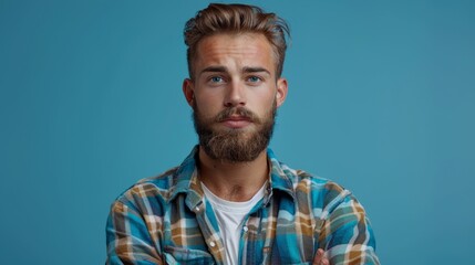 A man with a beard and plaid shirt posing for the camera, AI - Powered by Adobe
