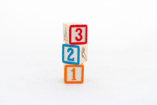 Colorful blocks with numbers stacked isolated on white background