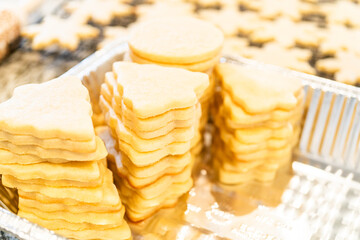 Baking Snowflake-Shaped Sugar Cookies for Homemade Christmas Gifts