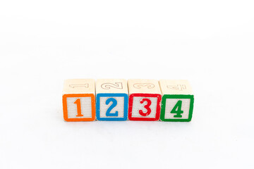 Wooden alphabet number blocks 1234 isolated on white background