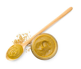 Fresh tasty mustard sauce in jar, spoon and dry seeds isolated on white, top view