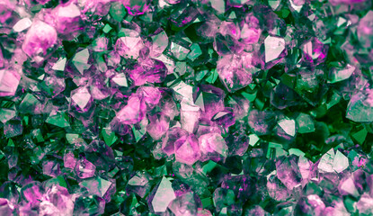 Multi-colored crystal mineral stone. Gems. Mineral crystals in the natural environment. Texture of precious and semiprecious stones. shiny surface of precious stone