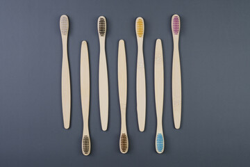  Toothbrushes on a grey backgorund. Eco-friendly toothbrushes..Health Care, Stomatology banner 