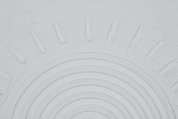 Close up of a textured drawing, Circular Design on White Wall