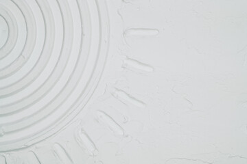 Close up of a textured drawing, Circular Design on White Wall
