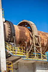 Cement factory. Pipes and compressors, equipment, metalurgy. Modern technologies work at a cement...
