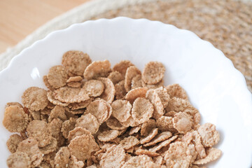 White Bowl Filled With Cereal on Table