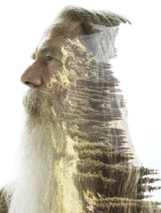 A double exposure profile portrait of an old man with a beard - 780592360