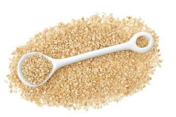 Sesame seeds in ceramic spoon isolated on white background. Top view. Flat lay