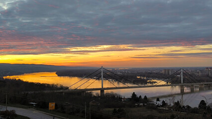 Fototapeta na wymiar sunset over the Danube river and city of Novi Sad in Serbia