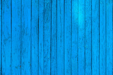 Fototapeta na wymiar blue paint wooden planks fence texture.