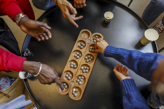 Awele (oware) (warri) (awari) African game, Festival at la Maison Bakhita, Paris, France