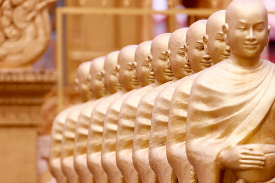 Statues showing Sangha with offering bowls (Alms for Buddhists monks), Mongkol Serei Kien Khleang Pagoda, Phnom Penh, Cambodia, Indochina, Southeast Asia