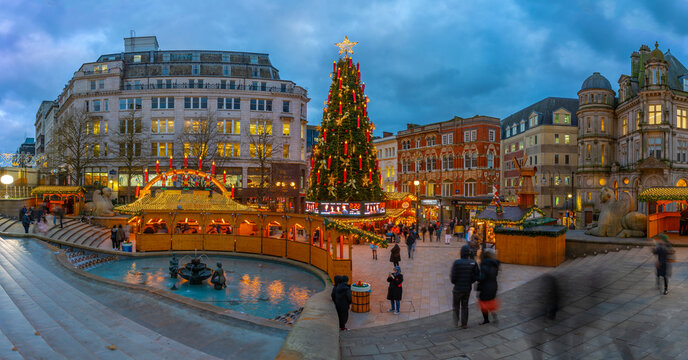 View of Christmas Market stalls and Christmas tree in Victoria Square, Birmingham, West Midlands, England, United Kingdom