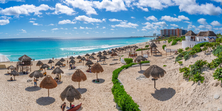 View of long white sandy beach at Playa Delfines, Hotel Zone, Cancun, Caribbean Coast, Yucatan Peninsula, Mexico