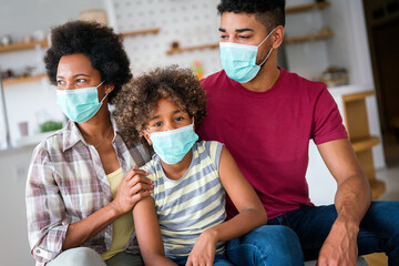 Family is wearing facemasks during coronavirus and flu outbreak. Virus and illness protection, COVID - 780627999