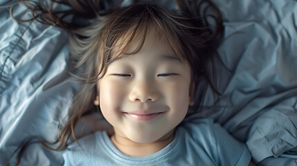 Happy Asian Toddler Resting on Bed, Radiating Joyful Serenity