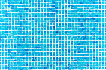 Ripples on the surface of the water in a blue swimming pool