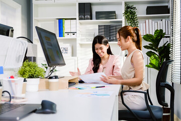 The young group of Asian attractive businesswomen adviser in casual sitting and discussing during the meeting on working table at office. Professional business adviser. Businesswomen in a meeting. - 780640548