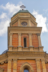Clock Dial and Cross at Saint Elias Orthodox Church Tower in Craiova Romania
