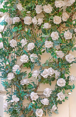 White Roses With Green Foliage at Wall Artificial Decoration