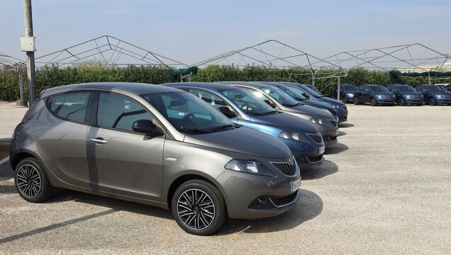 Tavagnacco, Italy. April, 7 2024. New models of Lancia Ypsilon cars in a row outside the official dealer of the italian automaker