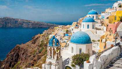 Discover the beauty of Santorini's streets with this close-up photo, highlighting the vibrant colors and unique architecture - obrazy, fototapety, plakaty