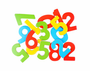Colorful numbers on white background, top view