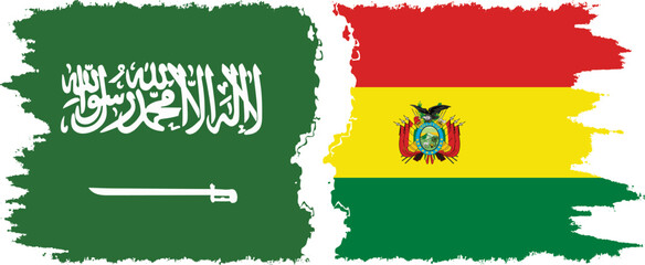 Naklejka premium Bolivia and Saudi Arabia grunge flags connection vector