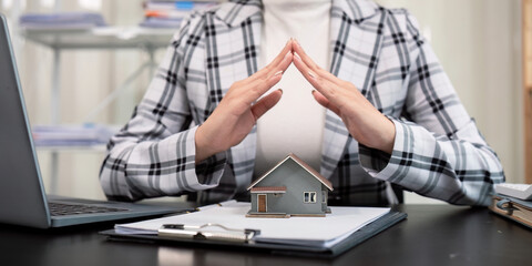 Real estate broker or home insurance agent gesture protect house, house key, contract document,...