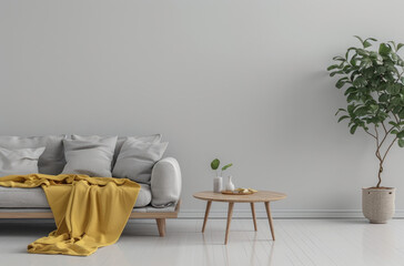 Sofa with a yellow blanket and a wooden coffee table in a grey living room interior with a dining area