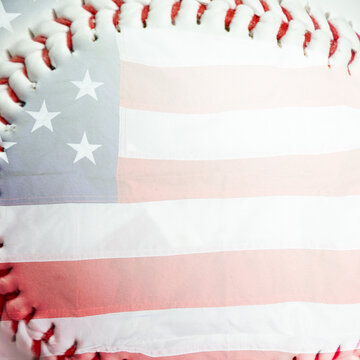 Red stitches of baseball with American flag