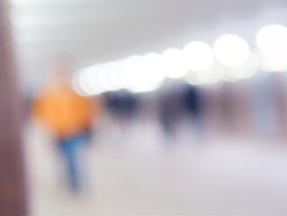 Walking people in city tunnel abstract bokeh background - 780680137