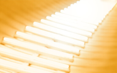Diagonally oriented warm light lamps abstract backdrop