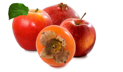 A set of fruits consisting of two apples, persimmons and pomegranates on a white background