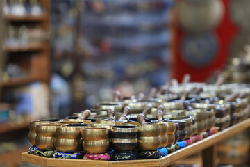 Singing bowls for tourist in souvenir shop. Tourism is the main economic sources in Nepal.