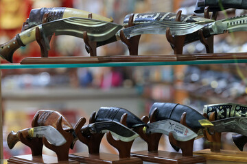 kukris are on sale in souvenir shop. Tourism is the main economic sources in Nepal.