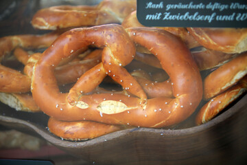 a baked Pretzel, traditional austrian cuisine - 780713933