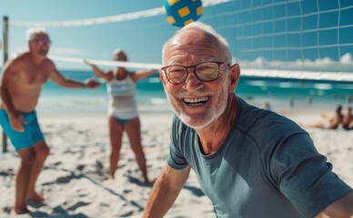 Joyful Senior Man with Friends Playing Beach Volleyball on Sunny Day