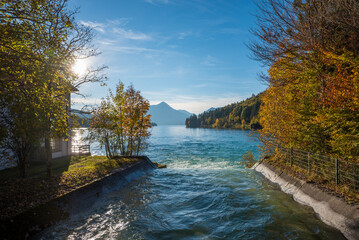 Rissbachstollen streaming into lake Walchensee, autumnal landscape bavaria - 780715193