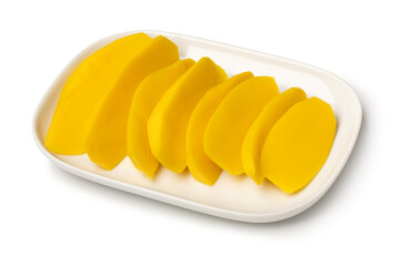 Plate with pickled mango slices isolated on white background close up
