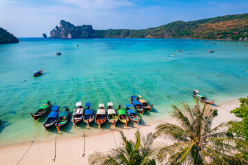 Island Phi Phi with longtail boat, turquoise clear water in Krabi Thailand. Amazing travel...