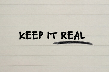 Keep it real words written on notebook page. Conceptual symbol. Copy space.
